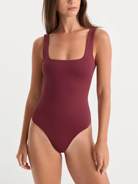 The Sculpting Modern Tank Bodysuit in Berry Noir