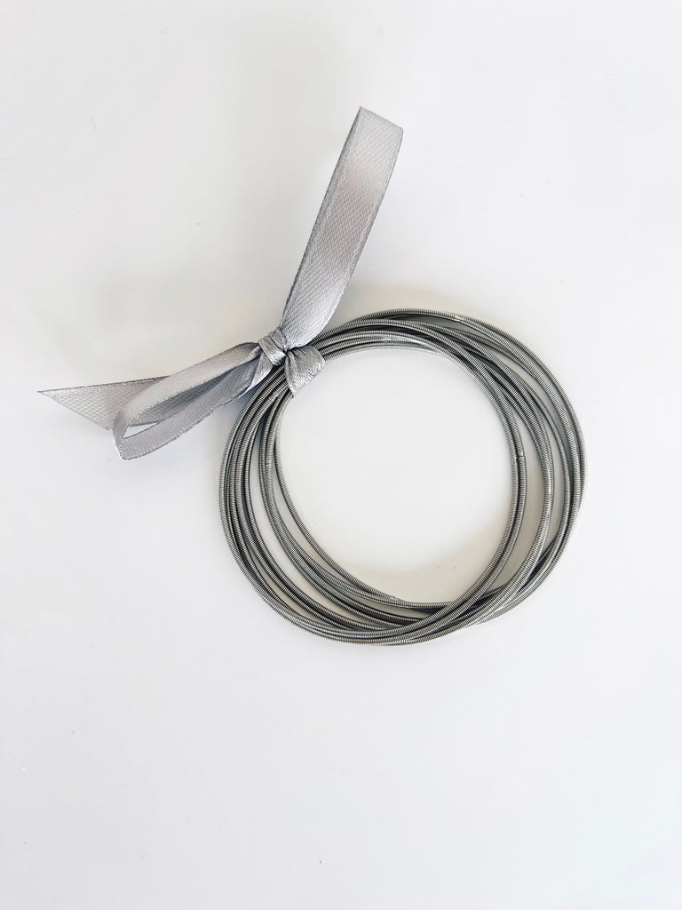 String 'Em Along Set in Silver