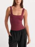 The Sculpting Modern Tank Bodysuit in Berry Noir