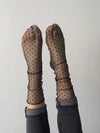 Maeva Mini Polka Dot Sock in Black