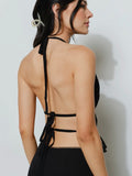 Feeling Flirty Backless Top in Black