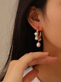 Helios Dangling Pearl Hoops