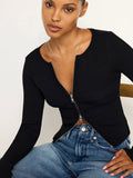 Virgo Rib Zip Front Sweater in Black