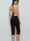 Feeling Flirty Backless Top in Black