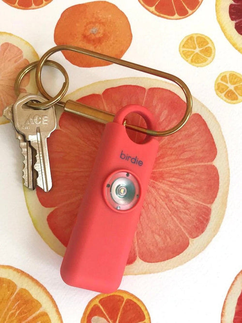 Birdie Personal Safety Alarm in Coral